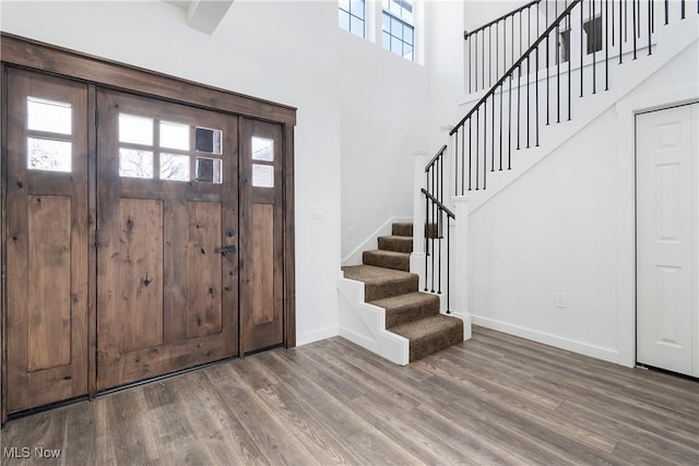 entrance foyer with hardwood / wood-style flooring