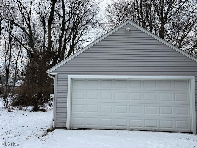 view of snow covered garage