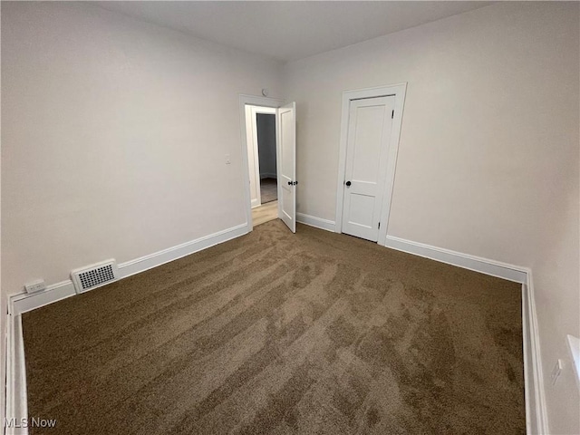 view of carpeted spare room