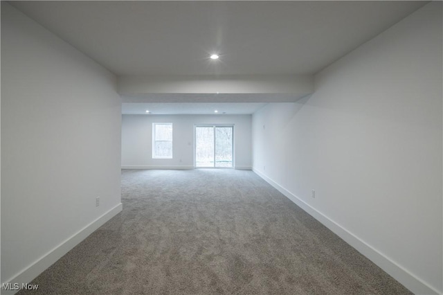 unfurnished room featuring recessed lighting, baseboards, and carpet floors
