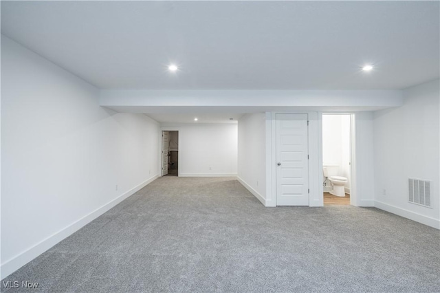 finished basement with recessed lighting, carpet flooring, visible vents, and baseboards