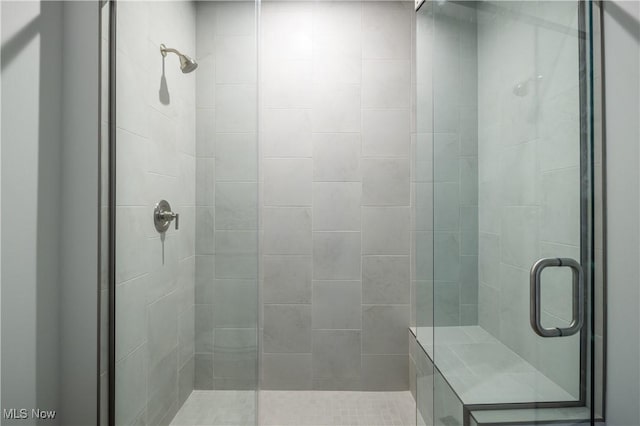 full bathroom with a shower stall