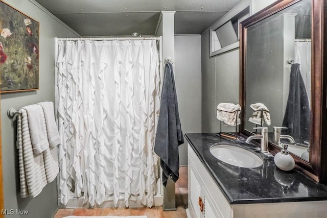 bathroom featuring vanity and walk in shower