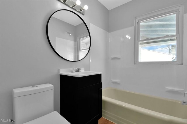 full bathroom featuring vanity, toilet, and shower / bathtub combination