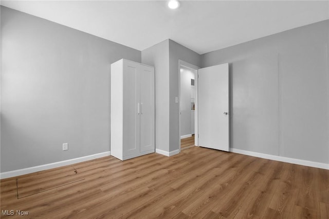 unfurnished bedroom featuring light hardwood / wood-style floors