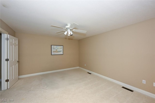 2142 Kirtland Pl, Hudson, OH 44236 - spare room with light colored carpet, a ceiling fan, and baseboards