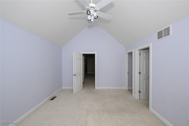 2142 Kirtland Pl, Hudson, OH 44236 - unfurnished bedroom featuring light colored carpet, vaulted ceiling, baseboards, and a ceiling fan