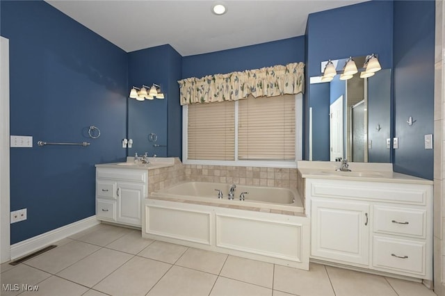 bathroom with tile patterned floors, vanity, and plus walk in shower