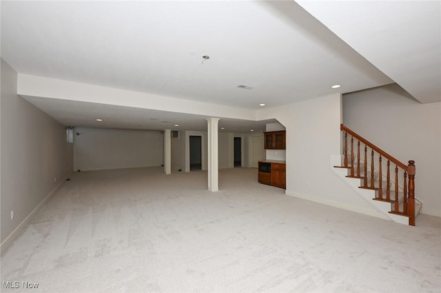 2142 Kirtland Pl, Hudson, OH 44236 - finished below grade area with light carpet, stairway, recessed lighting, and baseboards