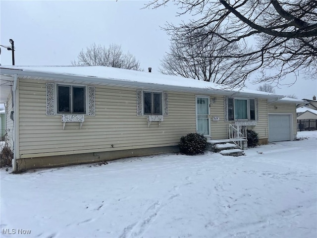 view of front of home featuring a garage