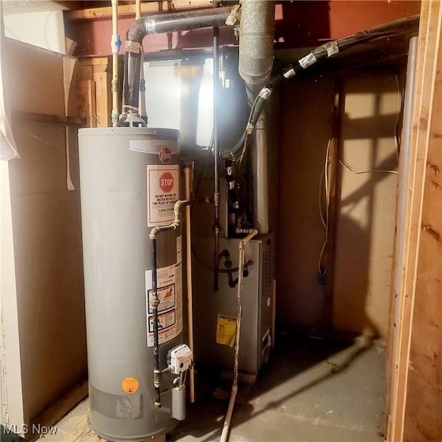 utility room with water heater