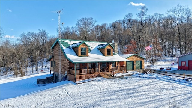 cabin featuring covered porch