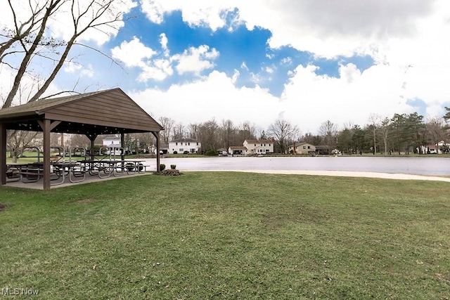 view of home's community featuring a gazebo and a lawn