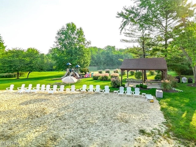 view of home's community with a gazebo, a playground, and a lawn