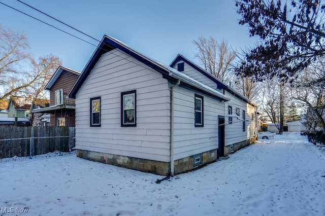 view of snow covered property