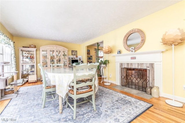 dining area featuring hardwood / wood-style floors