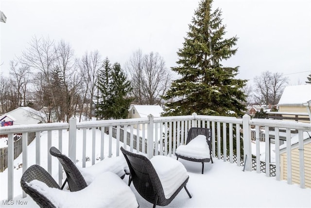 view of snow covered deck