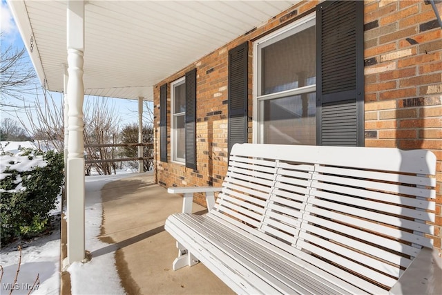 view of snow covered patio