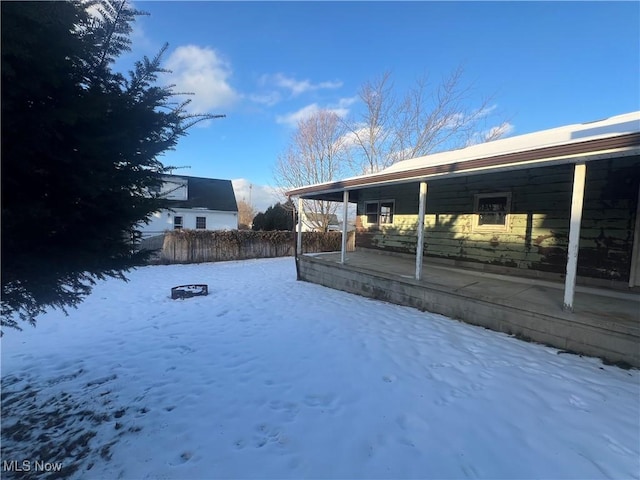 view of snowy yard