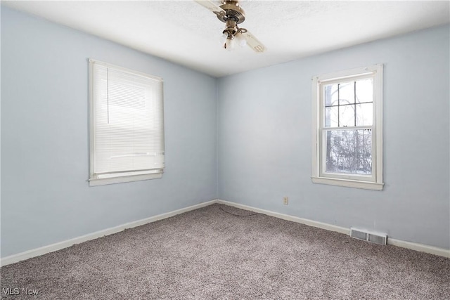 unfurnished room with carpet