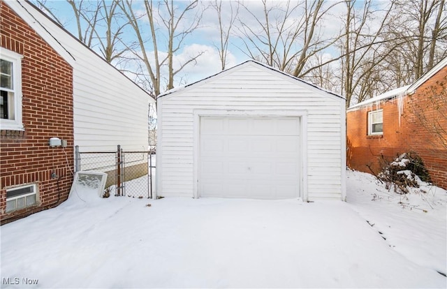 view of snow covered garage