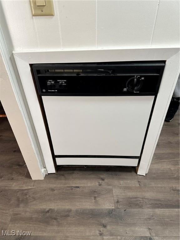 interior details featuring dark hardwood / wood-style flooring