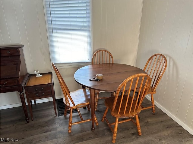 dining room featuring dark hardwood / wood-style floors