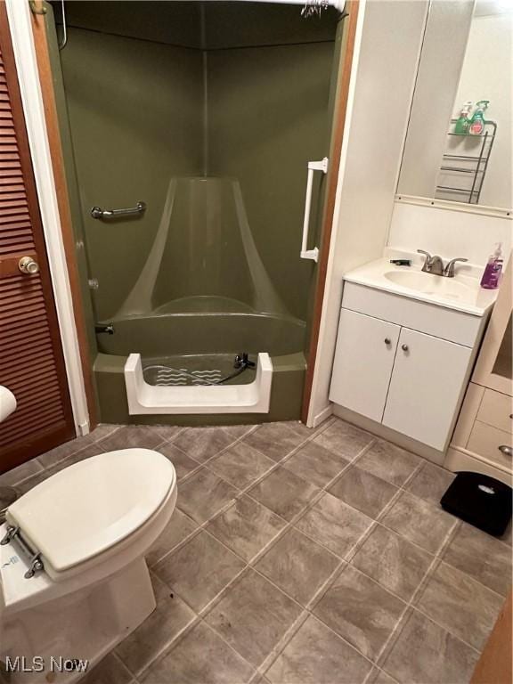 full bathroom with toilet, vanity, and shower / tub combination