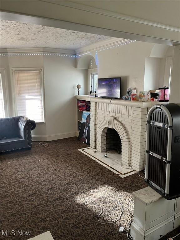 living room featuring carpet flooring, a brick fireplace, and ornamental molding