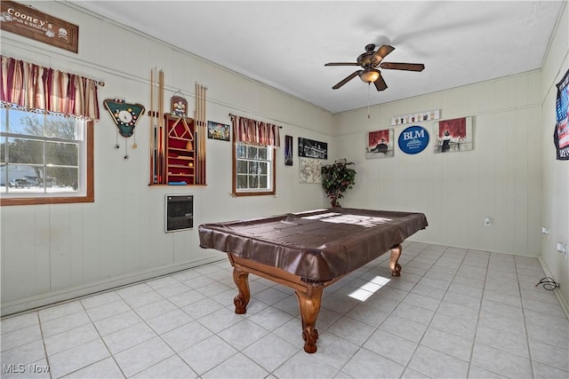 playroom with heating unit, ceiling fan, wood walls, and pool table