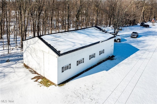 view of snow covered property