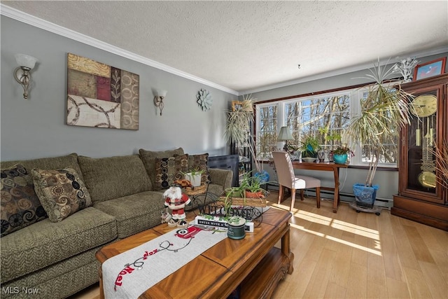 living room with a textured ceiling, hardwood / wood-style flooring, a baseboard radiator, and ornamental molding