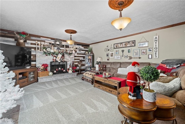 carpeted living room with a fireplace, a textured ceiling, and ornamental molding