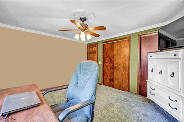 carpeted office space featuring ceiling fan, crown molding, and a textured ceiling