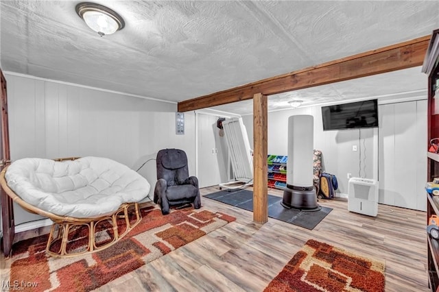 sitting room featuring light hardwood / wood-style flooring