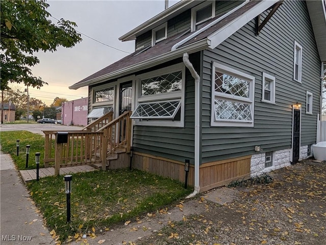 view of property exterior at dusk