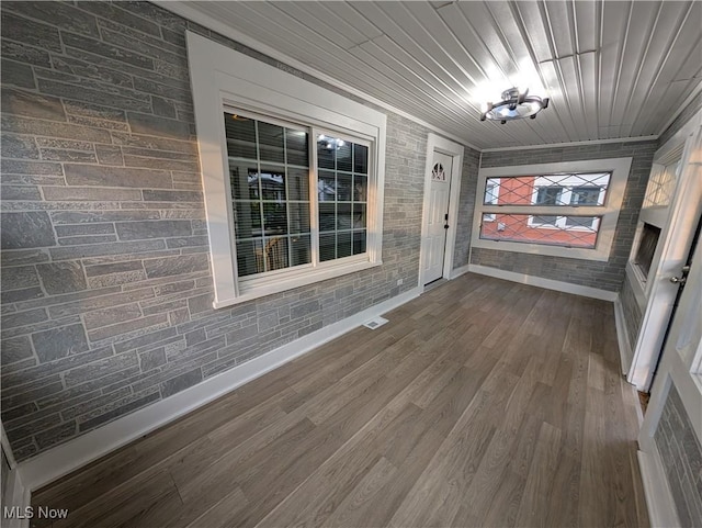 interior space featuring wood ceiling