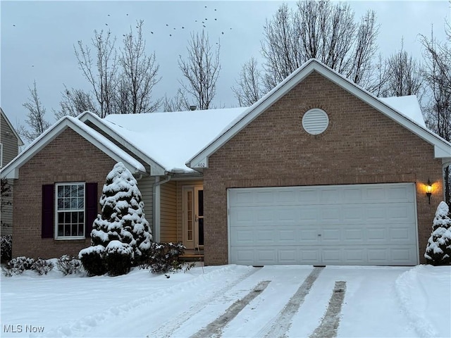 view of front of property with a garage