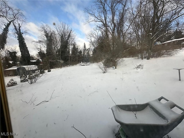 view of snowy yard