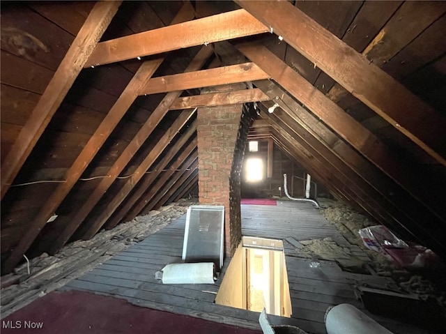 view of unfinished attic