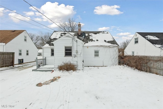 view of snow covered house