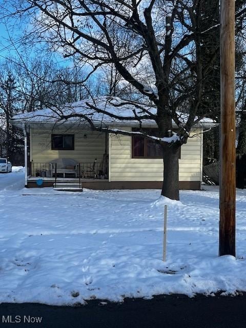 view of snow covered property