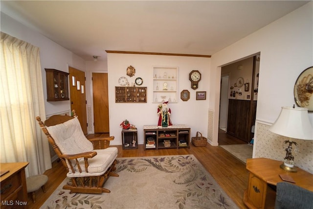 sitting room featuring dark hardwood / wood-style floors