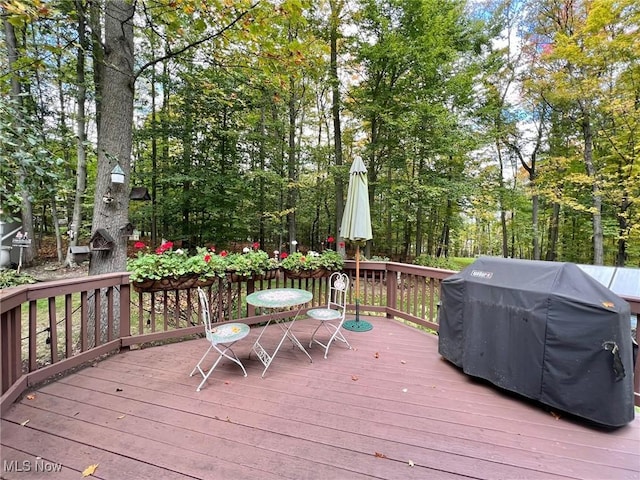 wooden terrace with grilling area