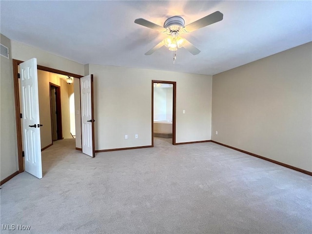 carpeted empty room with ceiling fan