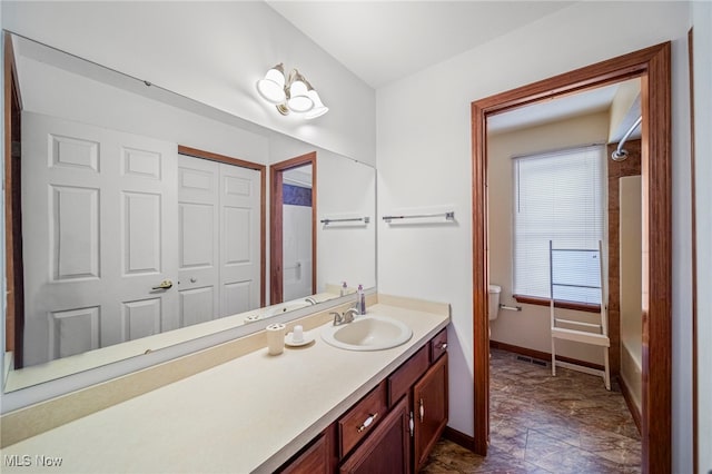 11579 Olde Stone Ct, Concord, OH 44077 - bathroom featuring toilet, vanity, and baseboards