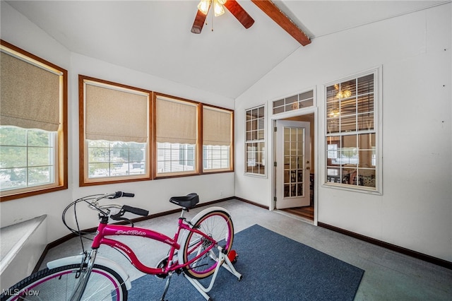 sunroom / solarium with lofted ceiling with beams and ceiling fan