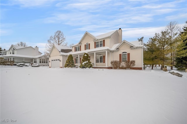 front of property featuring a garage