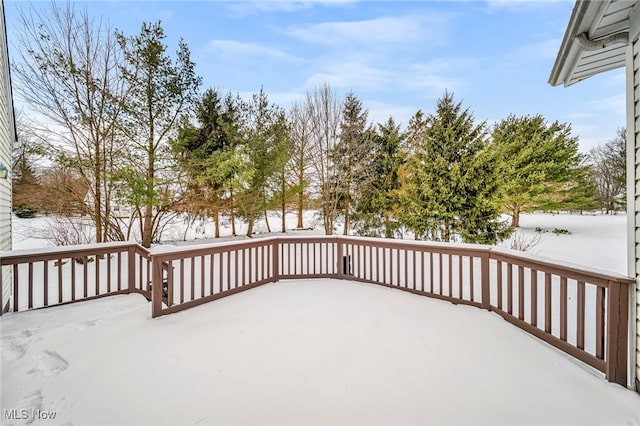 view of snow covered deck