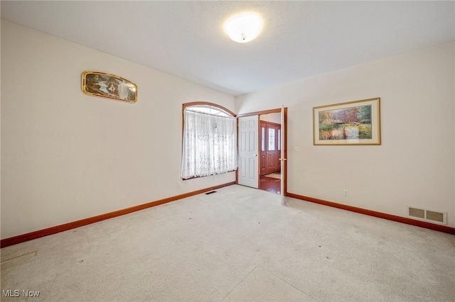 view of carpeted spare room